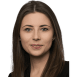 Headshot of Olivia Prisk, with dark brown hair and wearing a black top